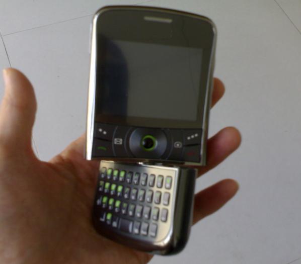 dual sim dual standby Trackpad navigation qwerty TV revolve mobile phone is a nice design