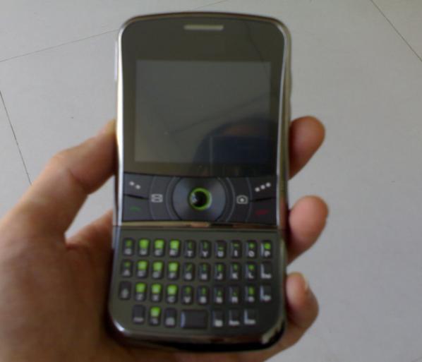 dual sim dual standby Trackpad navigation qwerty TV revolve mobile phone is a nice design