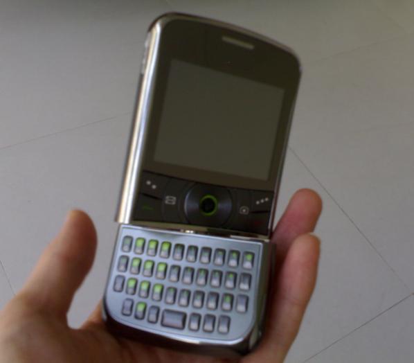 dual sim dual standby Trackpad navigation qwerty TV revolve mobile phone is a nice design